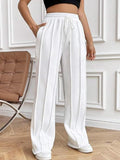 Pantalones de pierna ancha con cordón y bolsillos