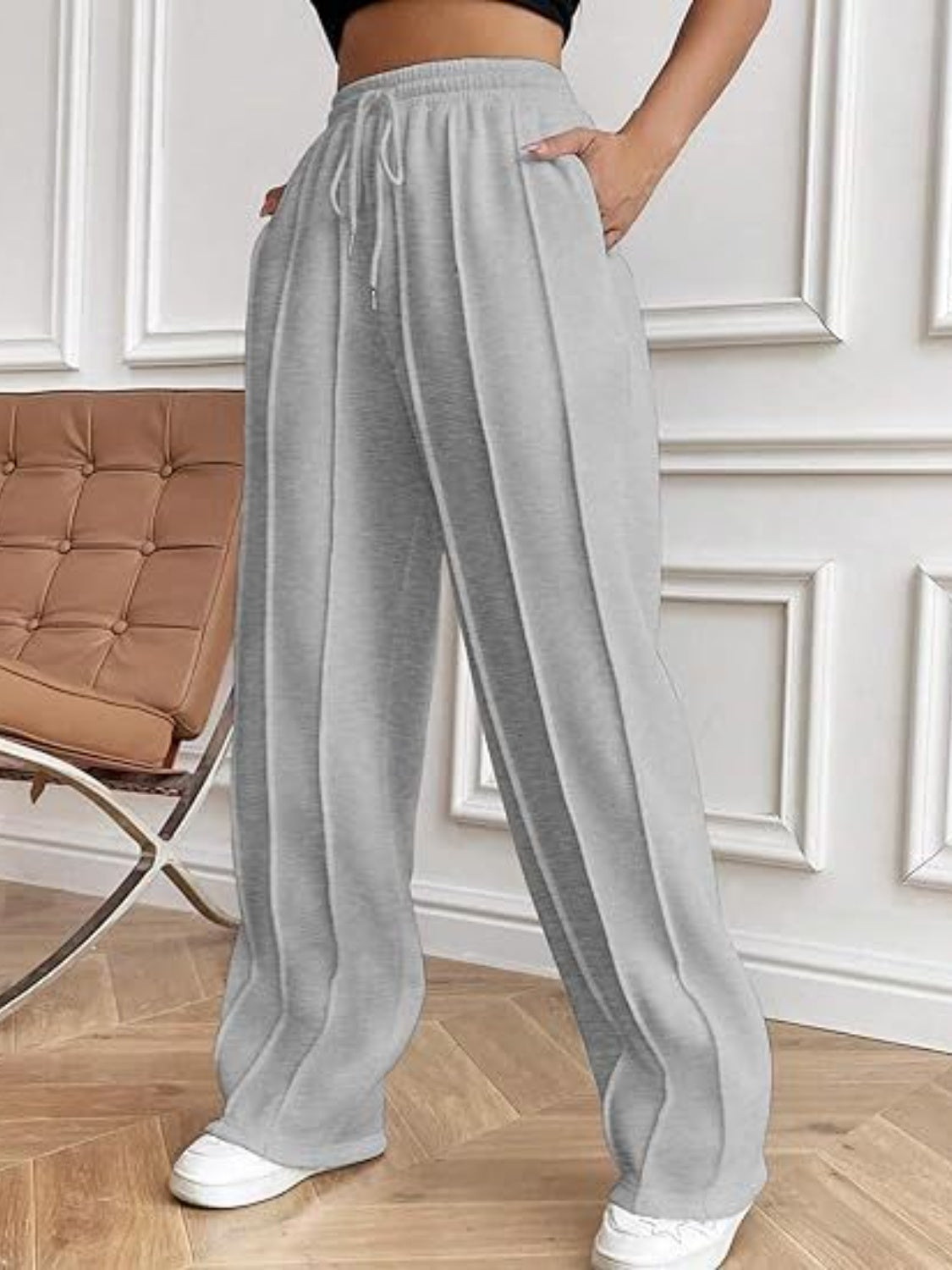 Pantalones de pierna ancha con cordón y bolsillos