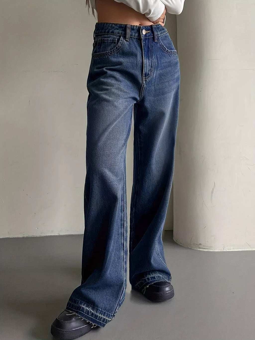 Jeans de pierna ancha con lavado vintage