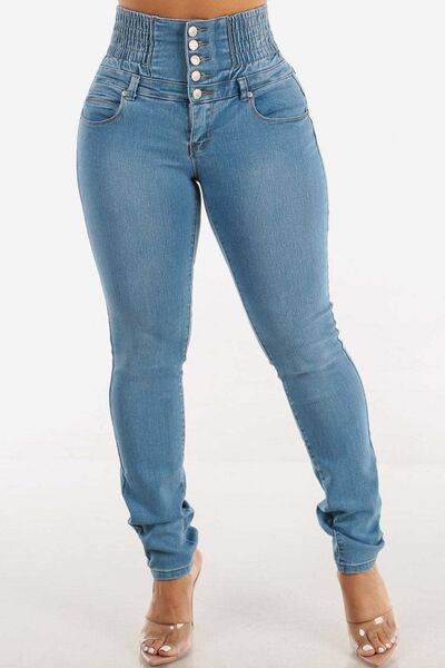 Jeans ajustados de cintura alta con botones y efecto realce de glúteos