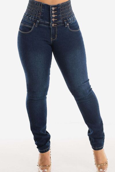 Jeans ajustados de cintura alta con botones y efecto realce de glúteos