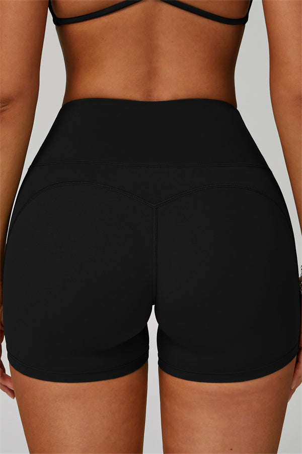 Gedurfde 2-delige sportset: bh met racerback en shorts