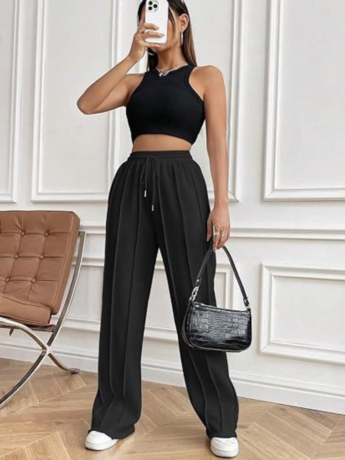 Pantalones de pierna ancha con cordón y bolsillos