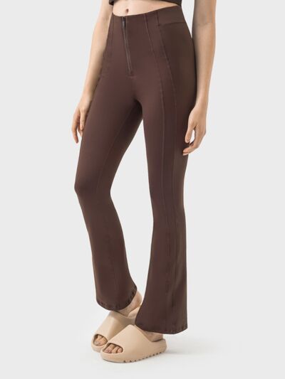 Pantalones deportivos de cintura alta con detalle de cremallera