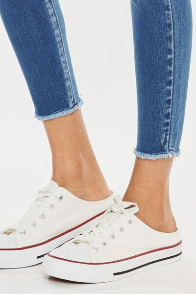 Jeans Kancan de cintura alta, desgastados y con dobladillo sin rematar