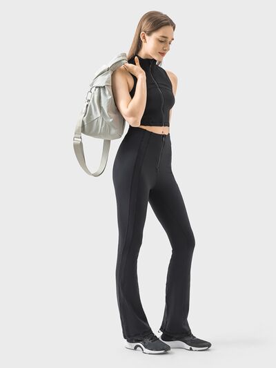 Pantalones deportivos de cintura alta con detalle de cremallera