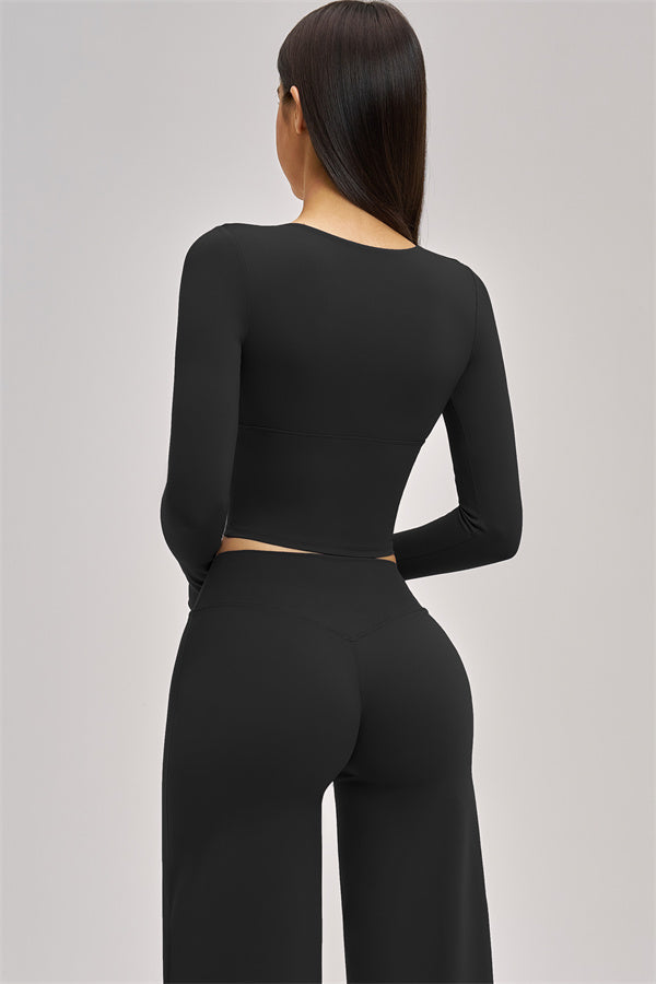 Conjunto de 2 piezas Swoon: top corto de manga larga y leggings acampanados