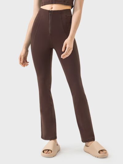 Pantalones deportivos de cintura alta con detalle de cremallera