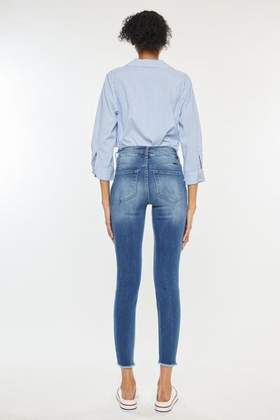 Jeans Kancan de cintura alta, desgastados y con dobladillo sin rematar