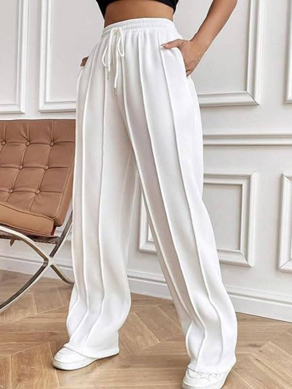 Pantalones de pierna ancha con cordón y bolsillos