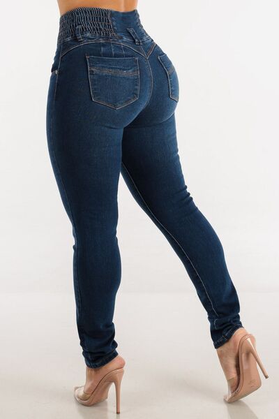 Jeans ajustados de cintura alta con botones y efecto realce de glúteos