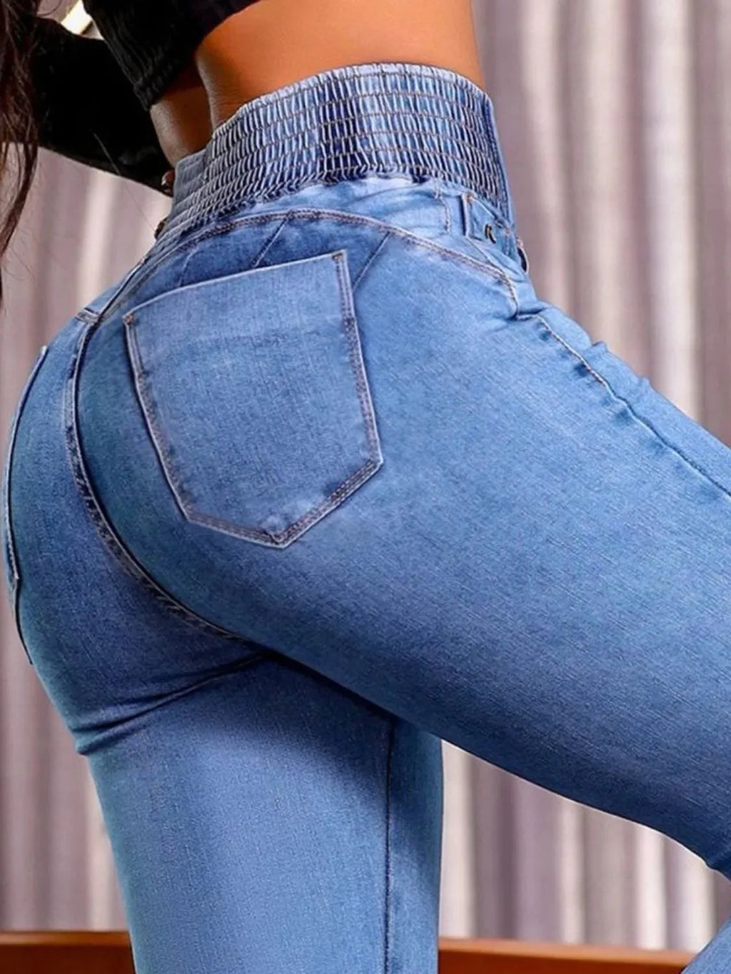 Jeans bootcut de tiro alto
