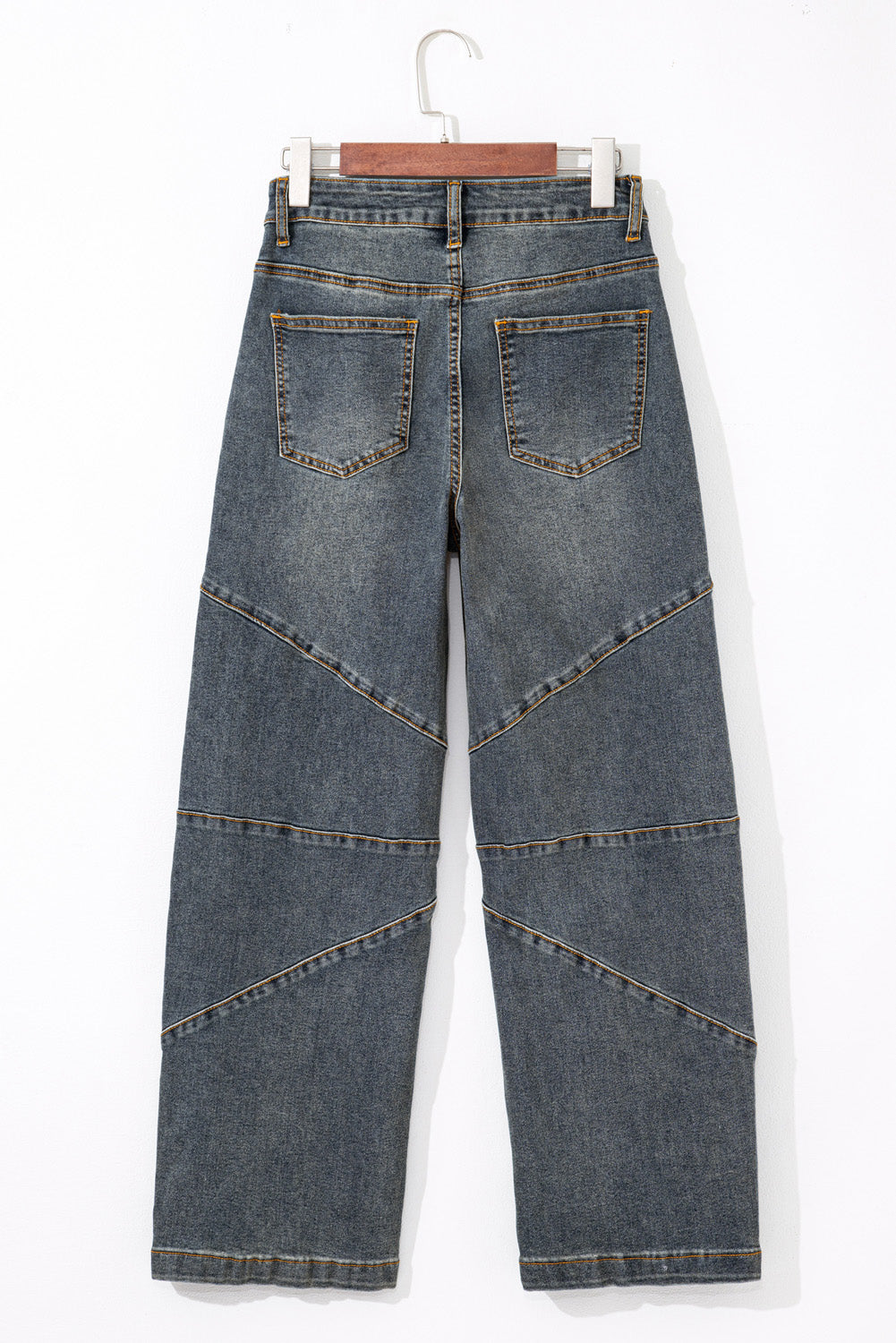 Jeans azul vela de tiro alto, pierna recta y diseño cruzado
