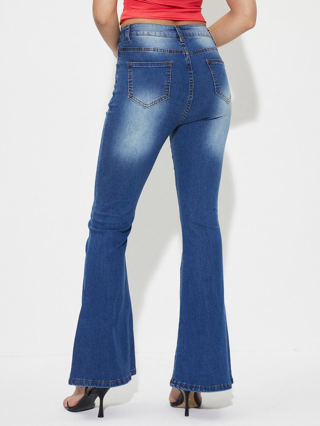 Jeans de tiro medio con corte de bota