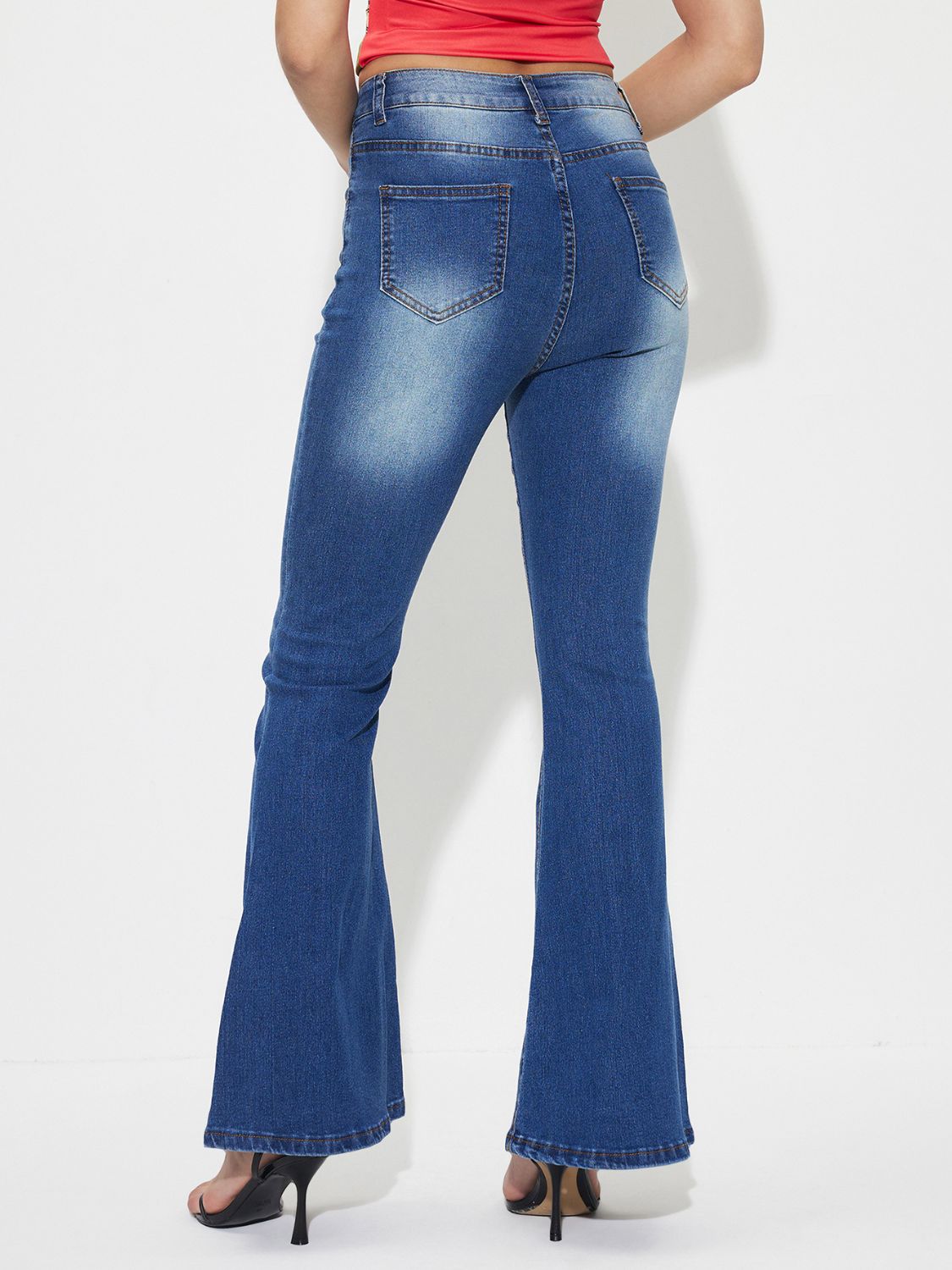 Jeans de tiro medio con corte de bota