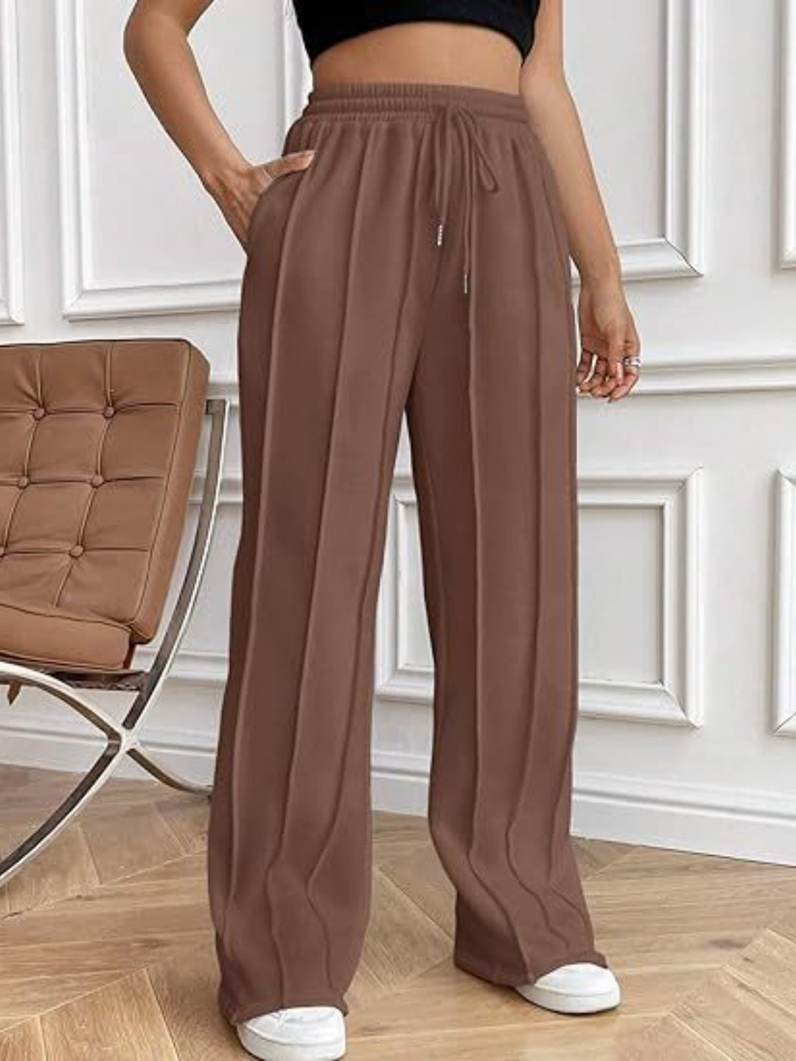 Pantalones de pierna ancha con cordón y bolsillos