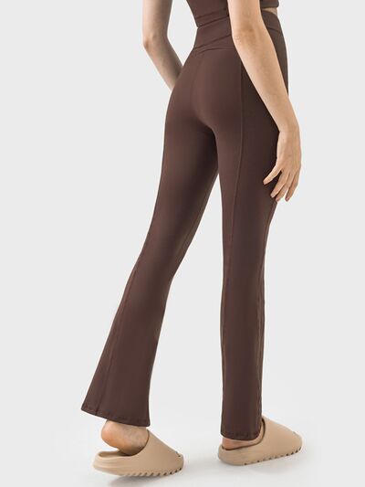 Pantalones deportivos de cintura alta con detalle de cremallera