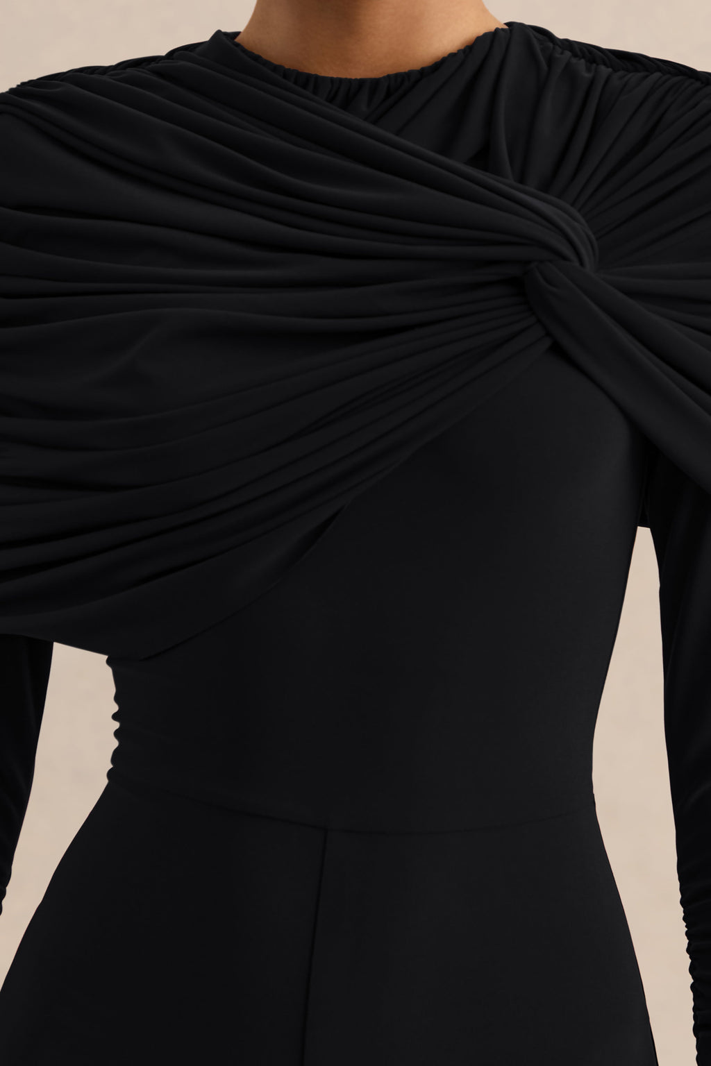 Eloura | Mono negro de jersey elástico premium con cuello alto y detalle de torsión fruncida