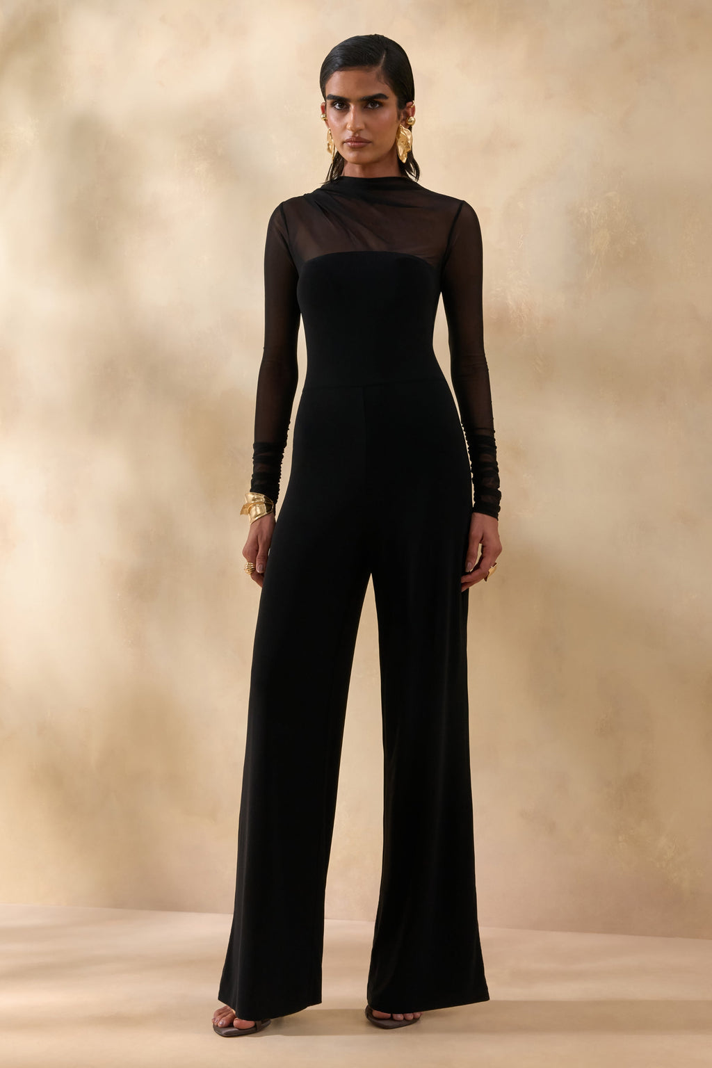 Emeria | Mono negro de cuello alto con mangas largas de malla