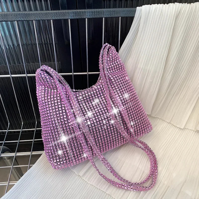 Bolso de mano brillante con pedrería