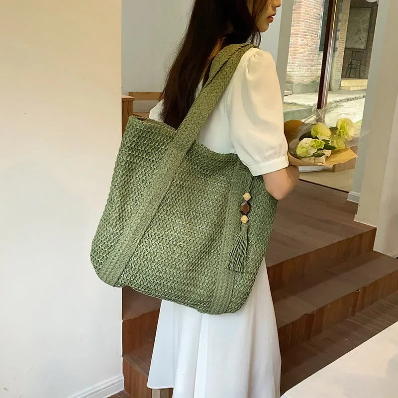 Bolso de mano elegante de paja tejida