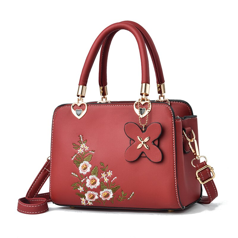 Bolso de mano de lujo bordado