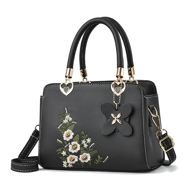Bolso de mano de lujo bordado