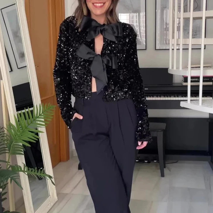 Chaqueta de lentejuelas con lazo delantero