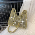 Bolso de mano brillante con pedrería