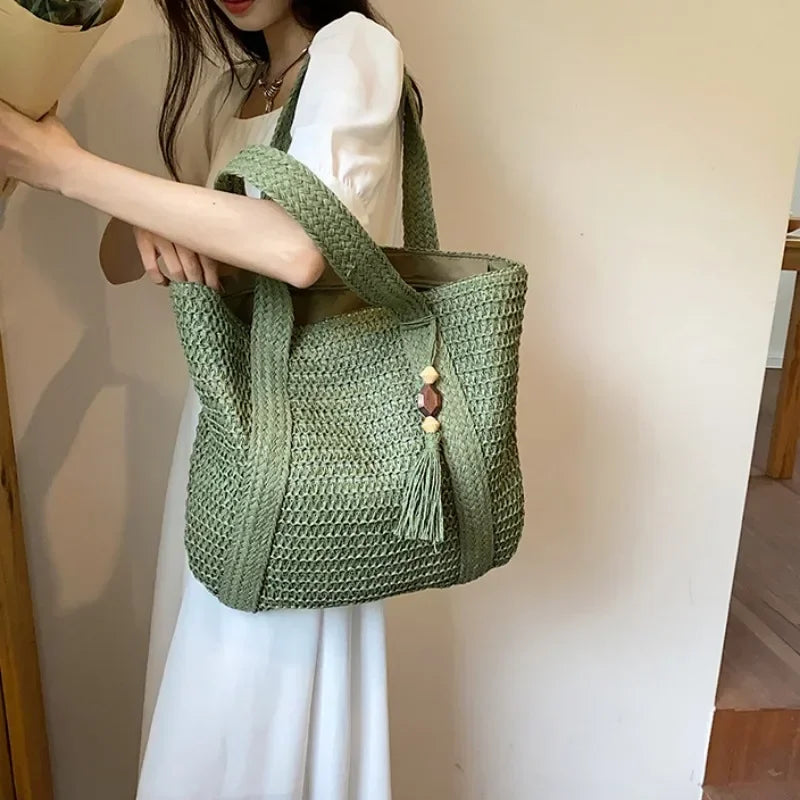 Bolso de mano elegante de paja tejida
