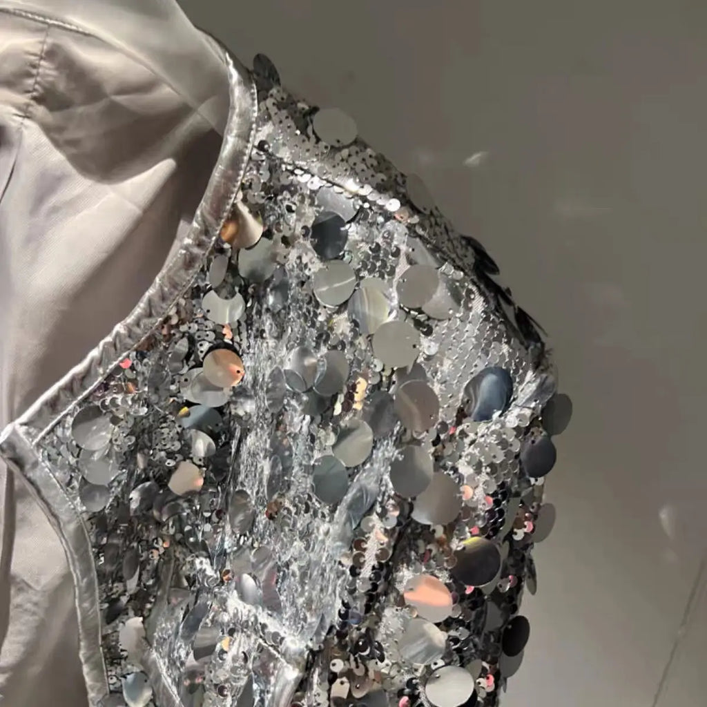 Chaqueta de fiesta brillante de manga larga