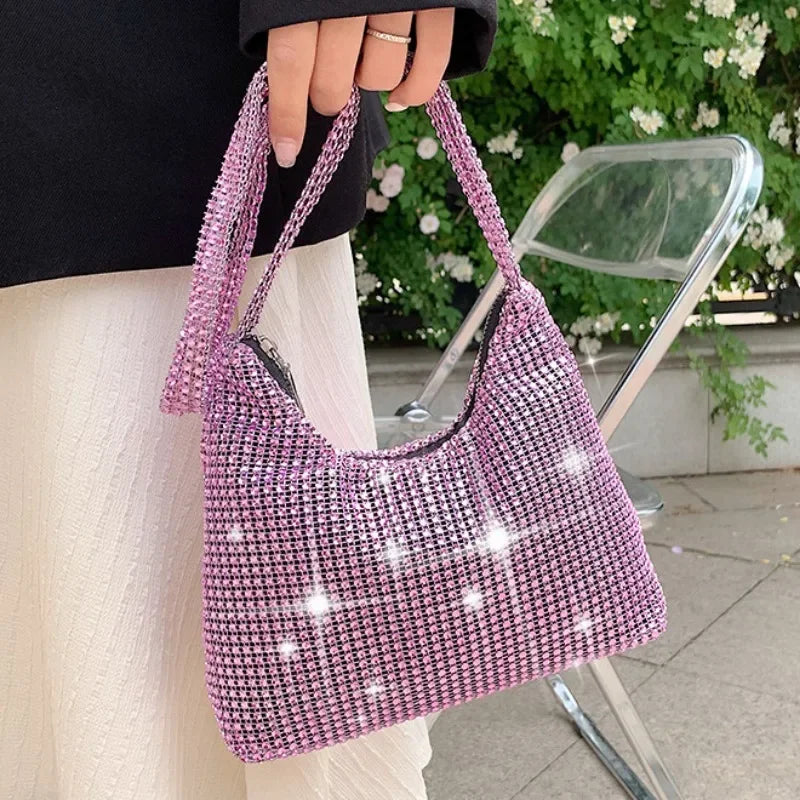 Bolso de mano brillante con pedrería