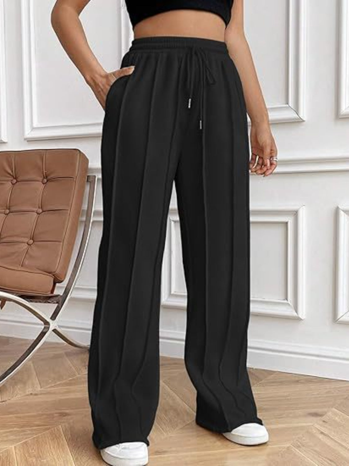 Pantalones de pierna ancha con cordón y bolsillos