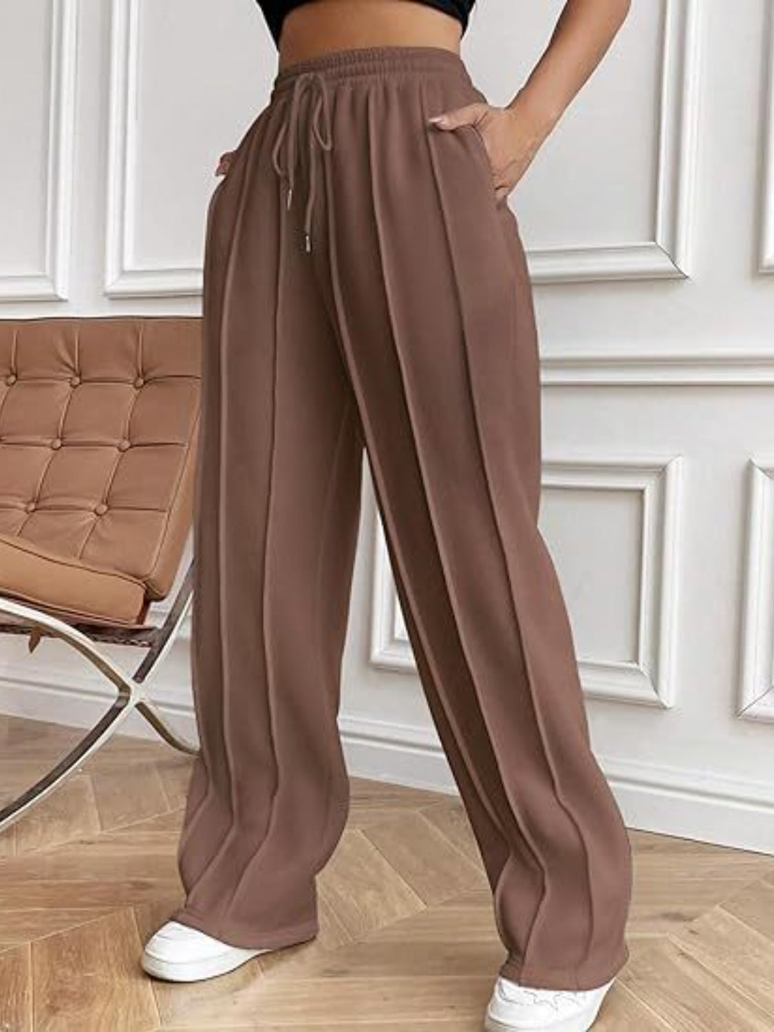 Pantalones de pierna ancha con cordón y bolsillos
