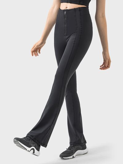 Pantalones deportivos de cintura alta con detalle de cremallera