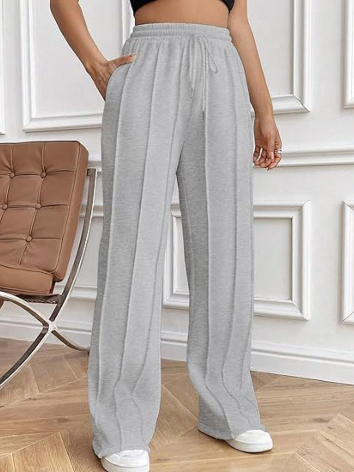 Pantalones de pierna ancha con cordón y bolsillos