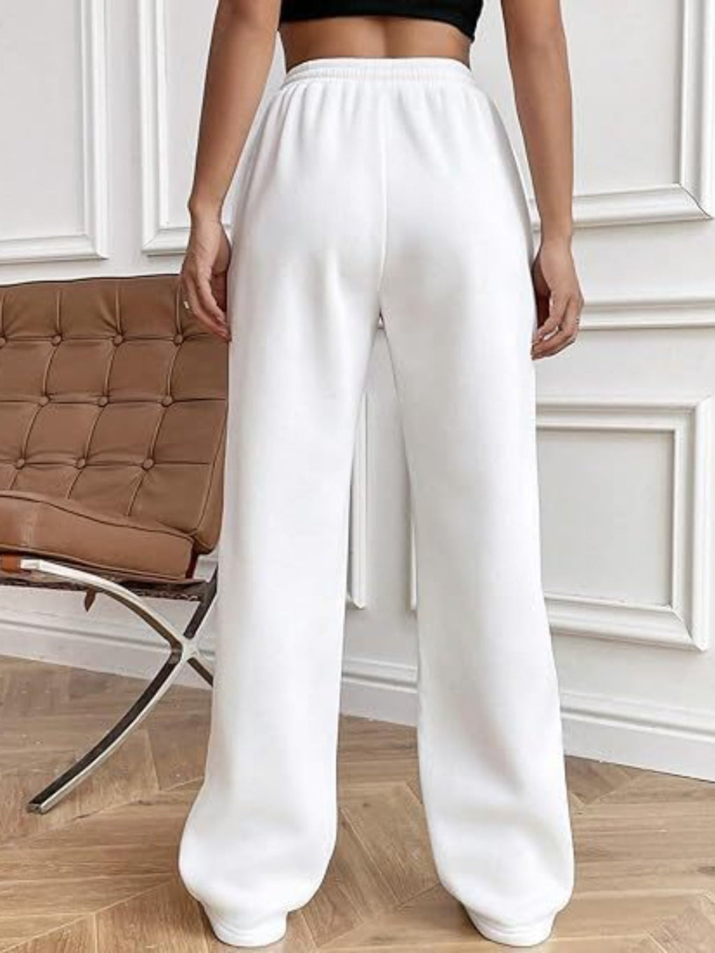 Pantalones de pierna ancha con cordón y bolsillos