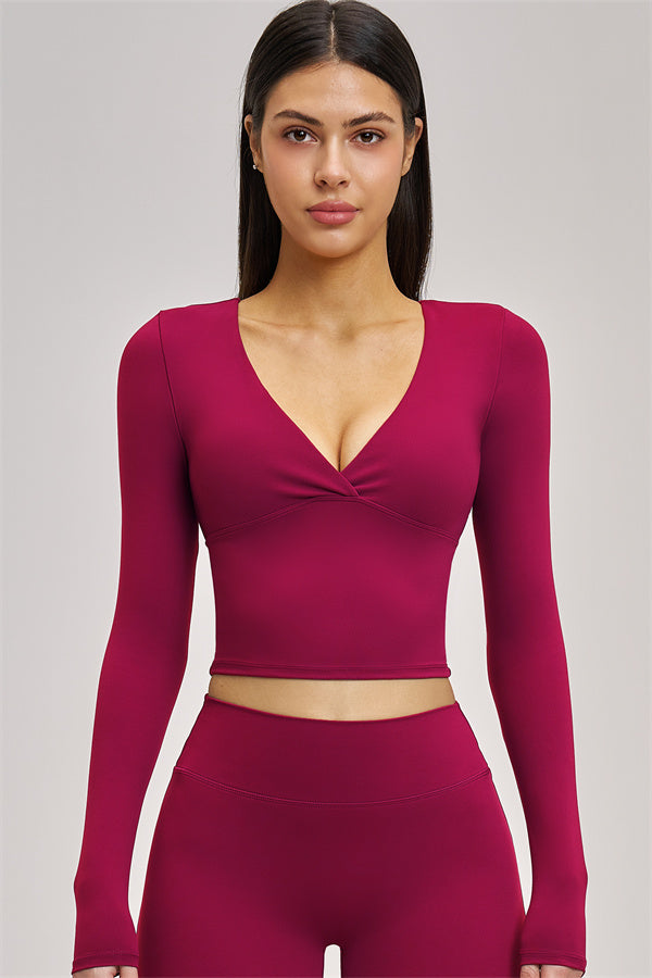 Conjunto de 2 piezas Swoon: top corto de manga larga y leggings acampanados