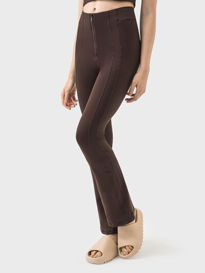 Pantalones deportivos de cintura alta con detalle de cremallera