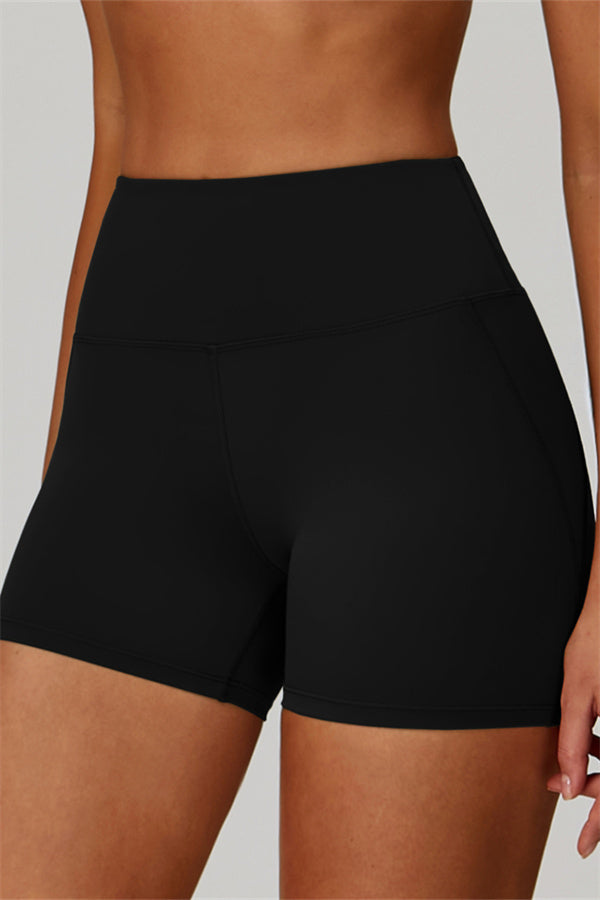 Gedurfde 2-delige sportset: bh met racerback en shorts