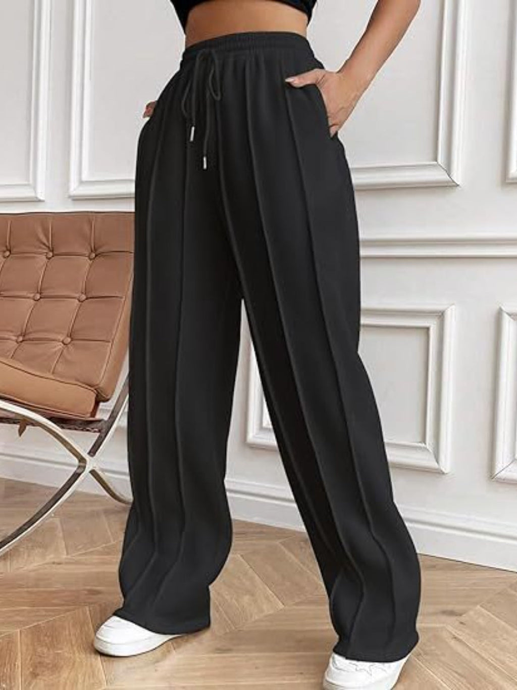 Pantalones de pierna ancha con cordón y bolsillos