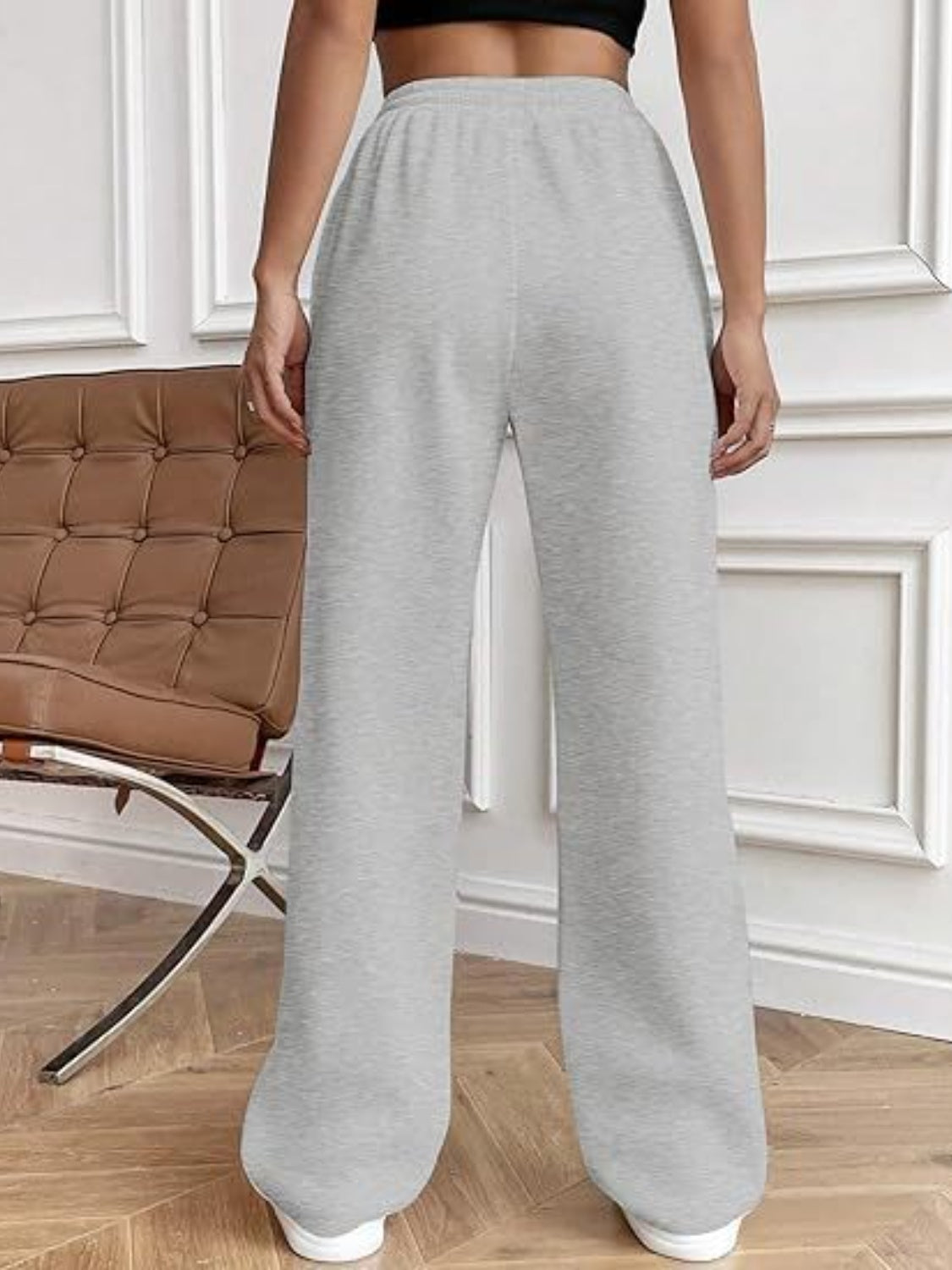 Pantalones de pierna ancha con cordón y bolsillos