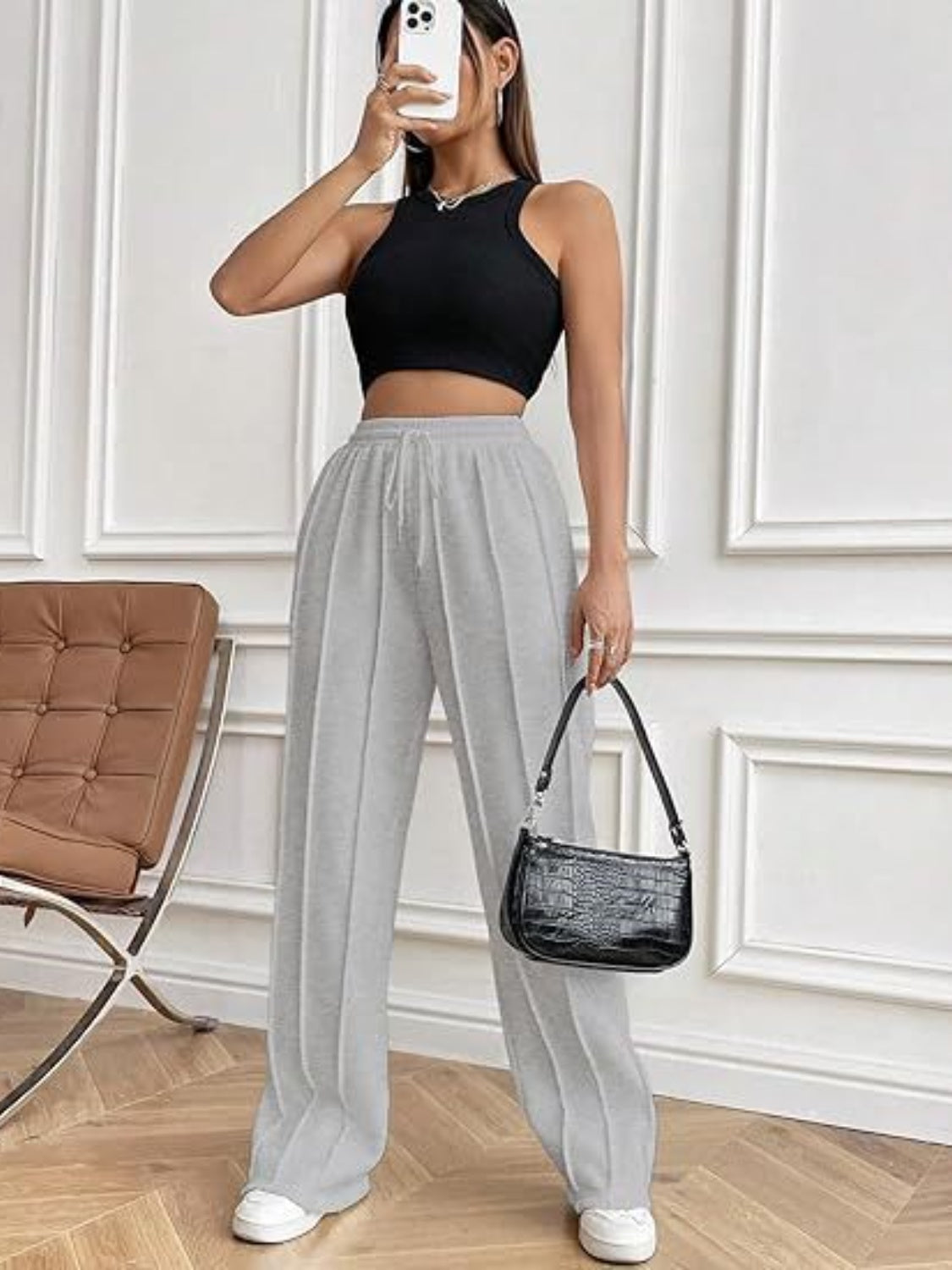 Pantalones de pierna ancha con cordón y bolsillos