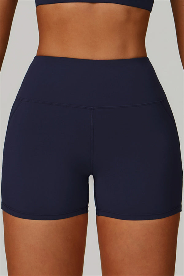 Gedurfde 2-delige sportset: bh met racerback en shorts