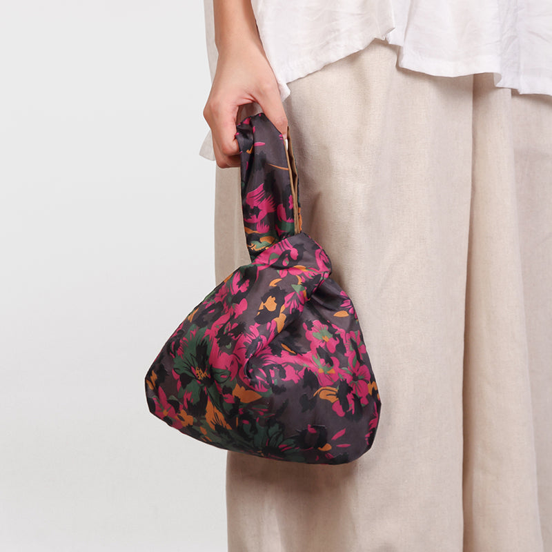 Bolso de muñeca con nudo