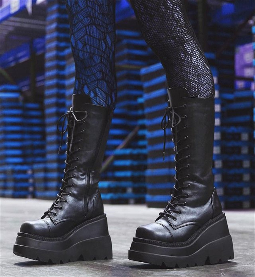 Botas elegantes de tacón alto