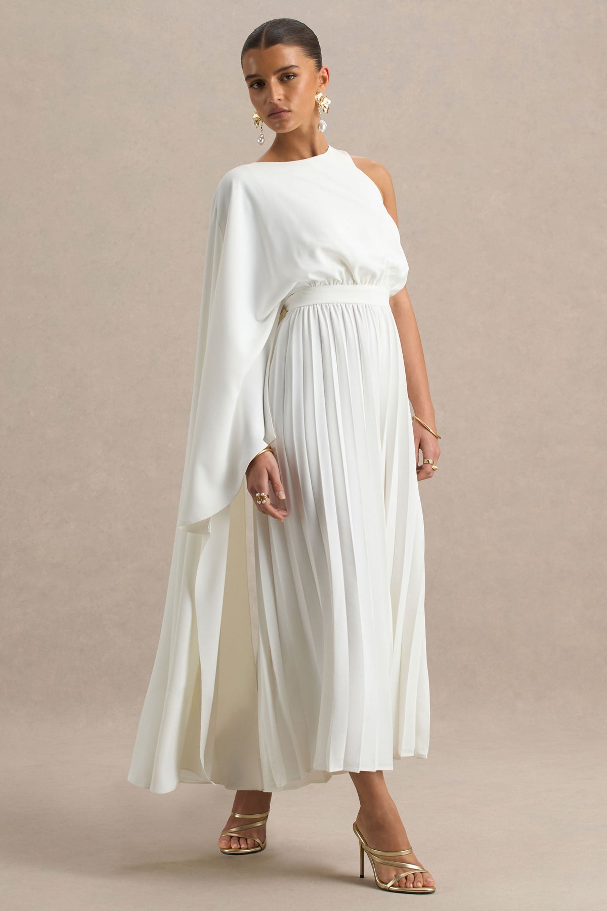 Paradise | Mono blanco con detalle de lazada en el cuello y manga tipo capa