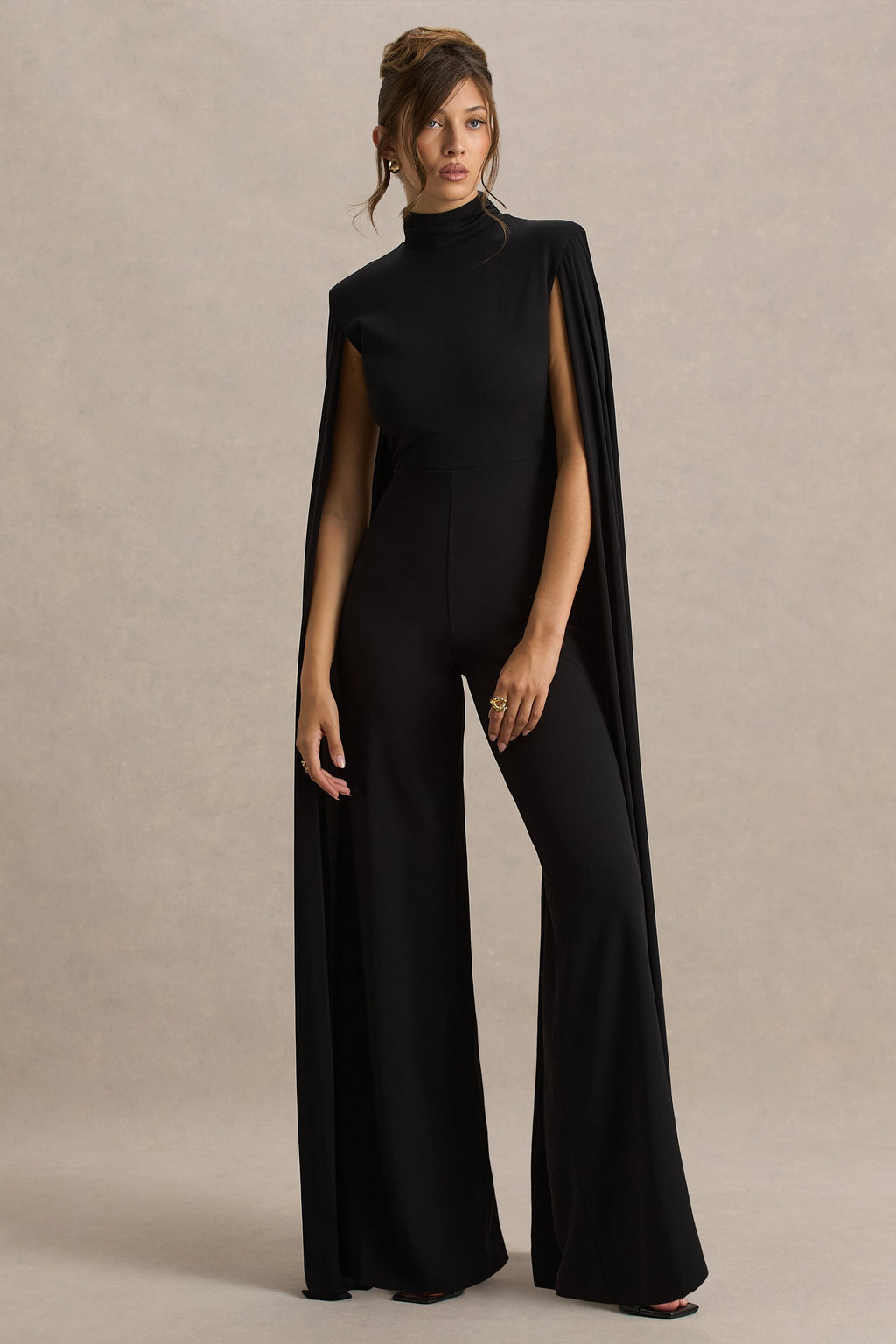 Dulcet | Mono negro de cuello alto y mangas tipo capa