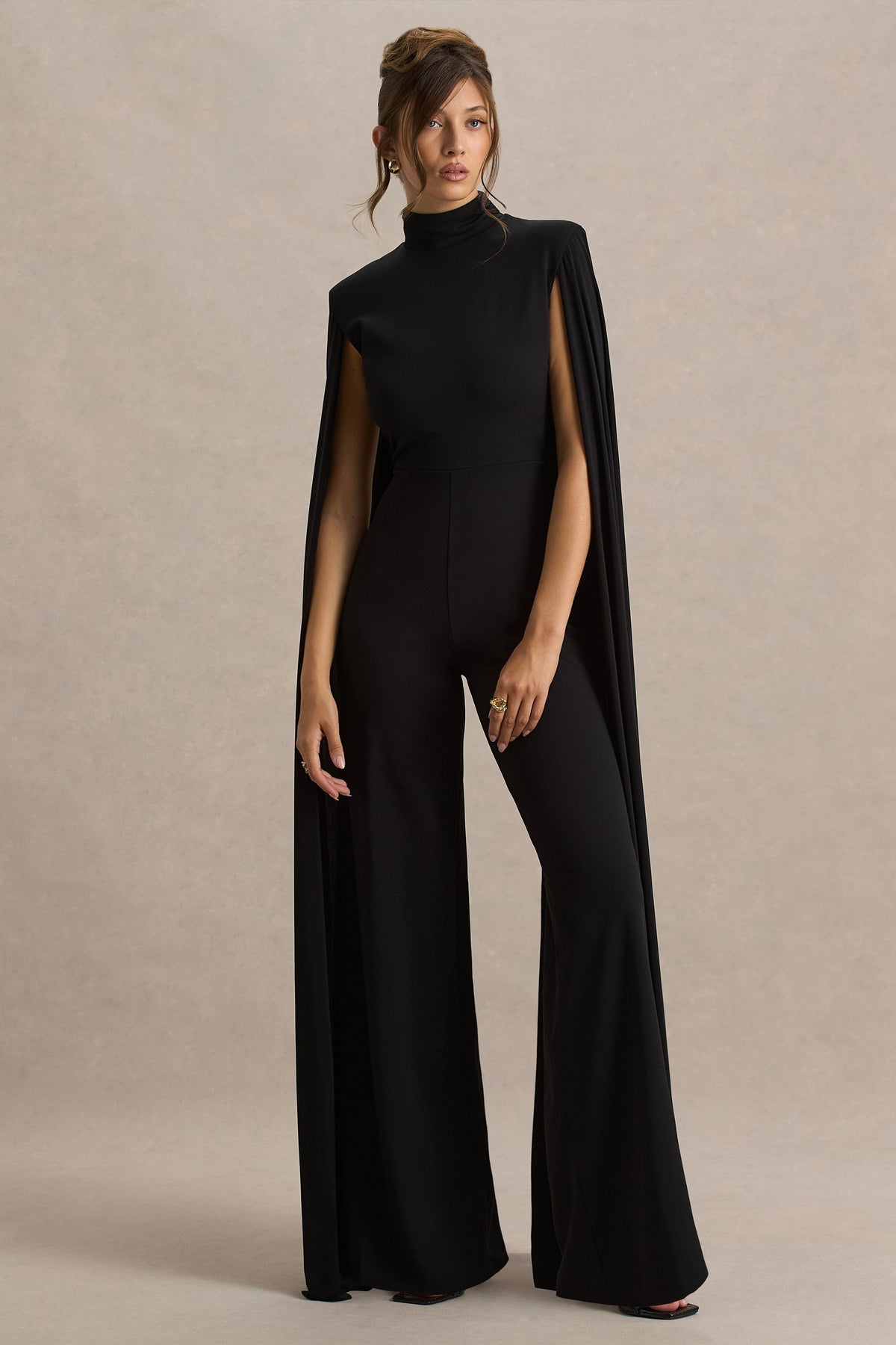 Dulcet | Mono negro de cuello alto y mangas tipo capa