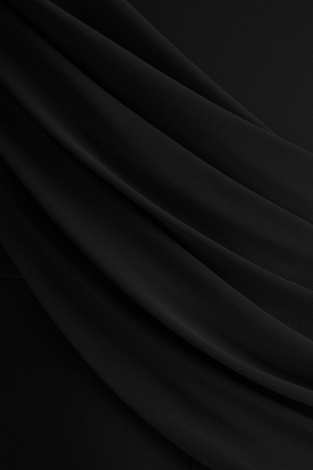 Labina | Mono negro con escote pronunciado y mangas capa